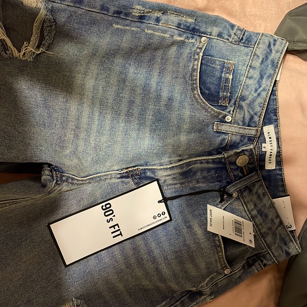 (NWT) 90s style jeans with rips along the side size 3